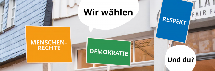 Demoschilder zur Aktion "Wir wählen: Menschenrechte, Demokratie und Respekt. Und du?"